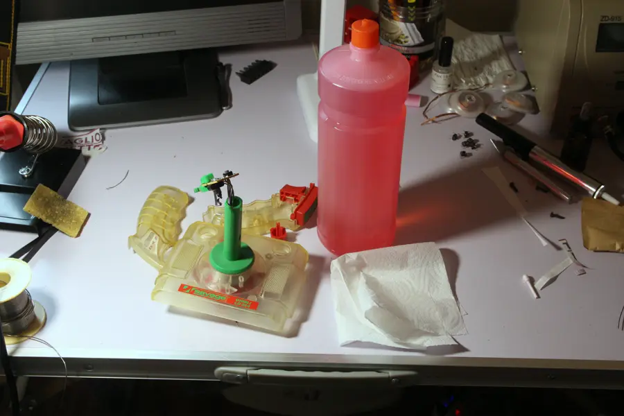 cleaning the top button