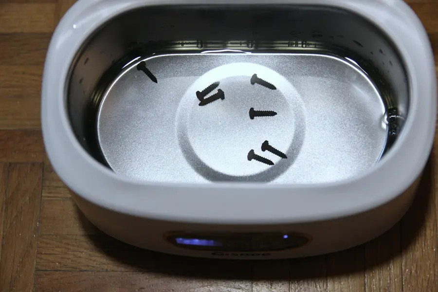 screws in the ultrasonic cleaner